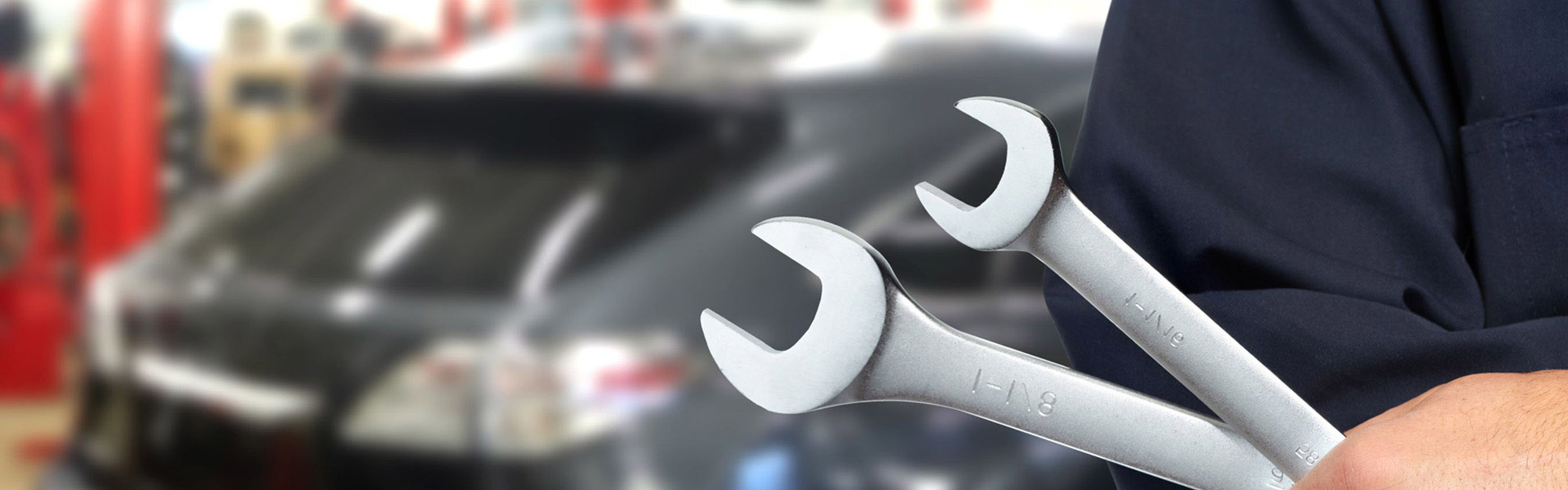 Technician Holding Wrench